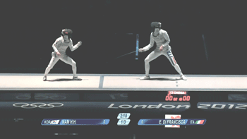 A photo of two fencing stars going at it and one getting the win.